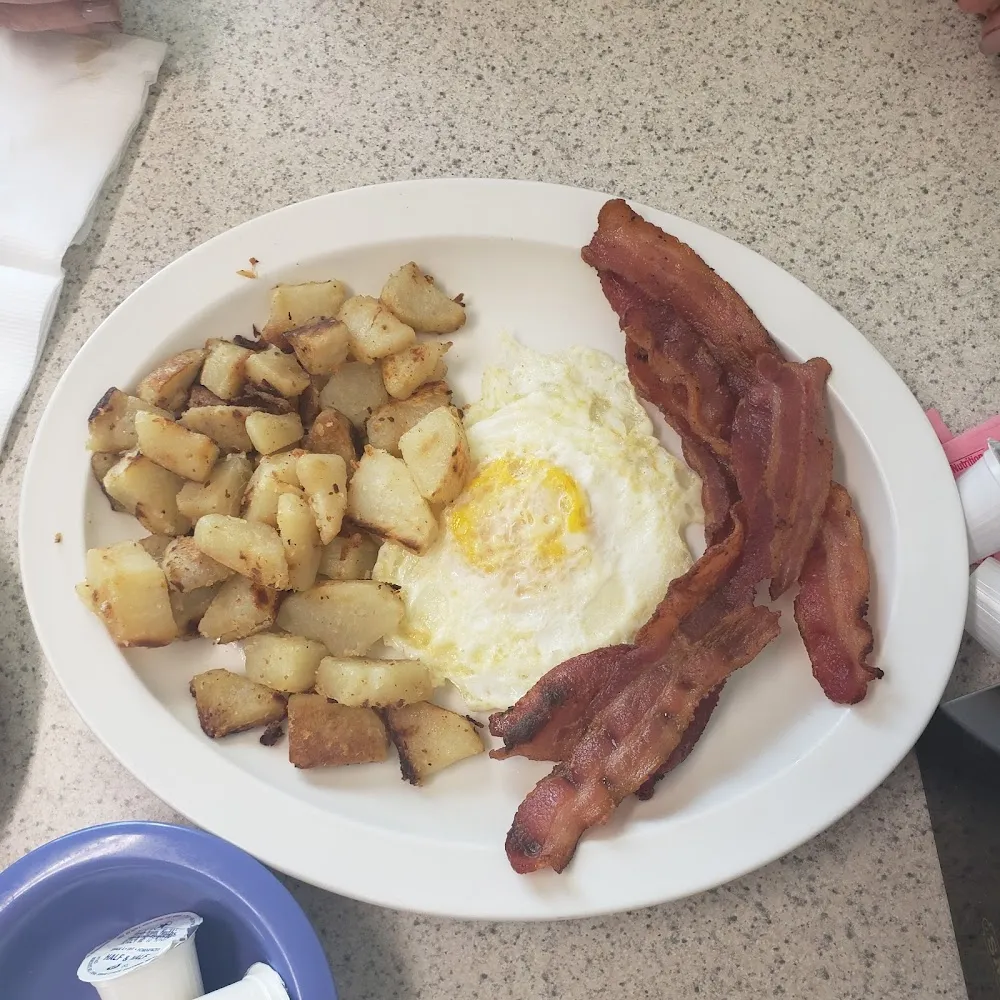 Eggs over Medium Breakfast Potatoes and Bacon